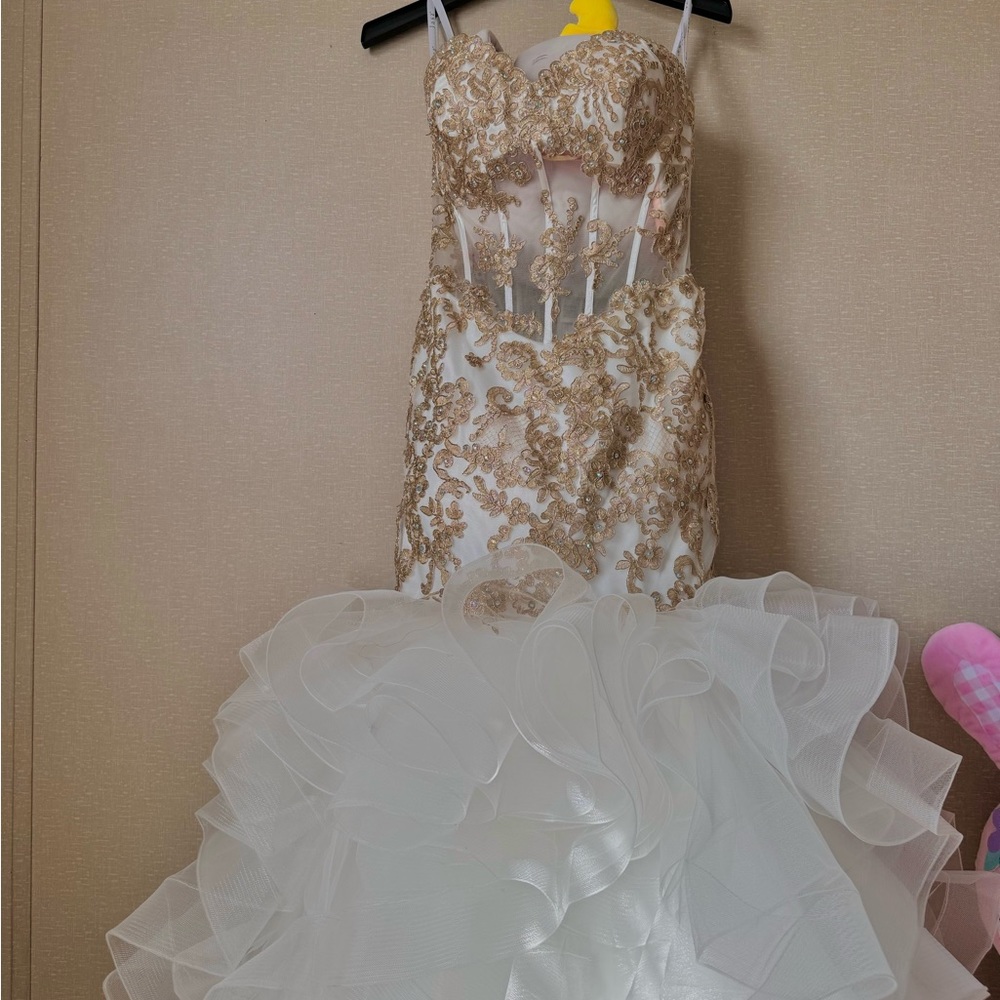Gold and white prom dress. Size 4, Brand is Jasz from Chicago IL.
